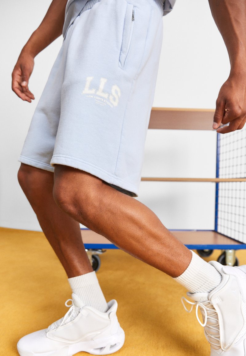 LOW LIGHTS STUDIOS® UNISEX Tracksuit bottoms skyblue/light blue