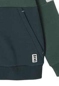 Dunkelgrüner Sweatshirt mit einem gerippten Saum und Tasche. Verfügt über ein mattes silbernes Akzent und eine glatte Textur. Enthält ein einzigartiges Design-Besatz.