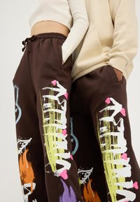 YOURTURN Tracksuit bottoms - dark brown