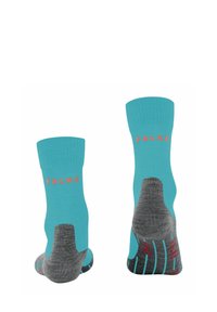 Calzini alla caviglia turchesi e grigi con logo FALKE; texture a costine nella parte superiore; aree con imbottitura nel tallone e nelle dita; motivo colorato sulla suola.