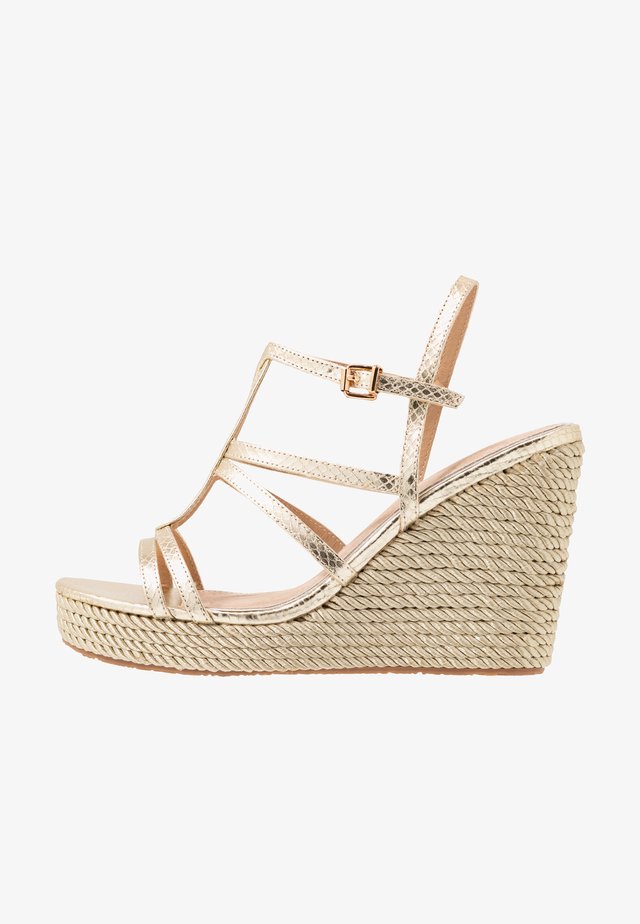 High heeled sandals - champagne