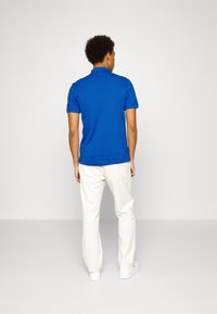 Lacoste Polo shirt - kingdom