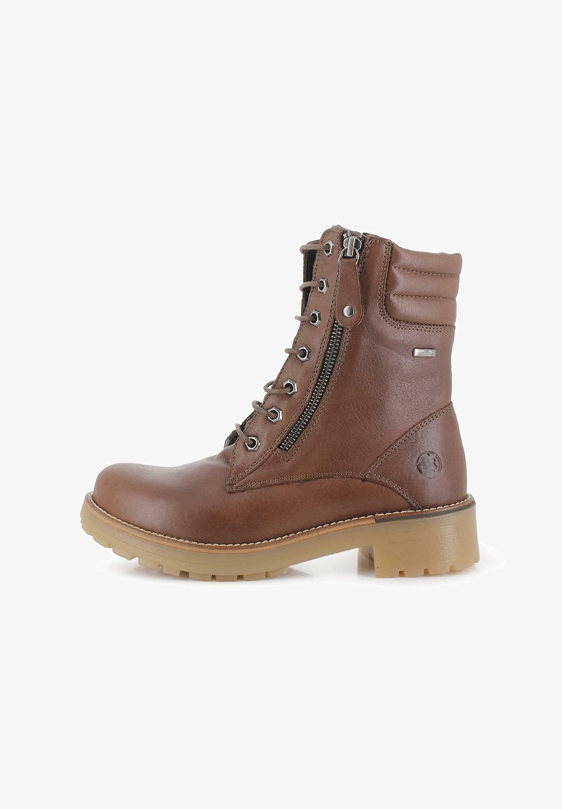 Bota de tobillo de cuero marrón con puntera redondeada, cremallera lateral y suela gruesa de goma. Cuenta con cordones y un cuello acolchado para mayor comodidad.