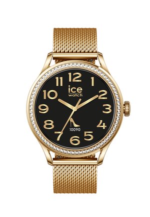 Orologio da polso con cinturino in maglia d'oro, quadrante nero, numeri arabi dorati, lunetta con cristalli e logo con icona di tacco alto posizionato alle ore 7.