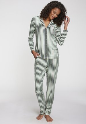Striped pajama set in green and cream, featuring a button-up shirt with a pocket and matching trousers. Soft fabric, long sleeves, and relaxed fit.