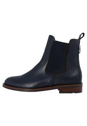 Navy leather ankle boot with elastic side panels, rounded toe, and a low stacked heel. Accented by a pull tab and contrasting sole.