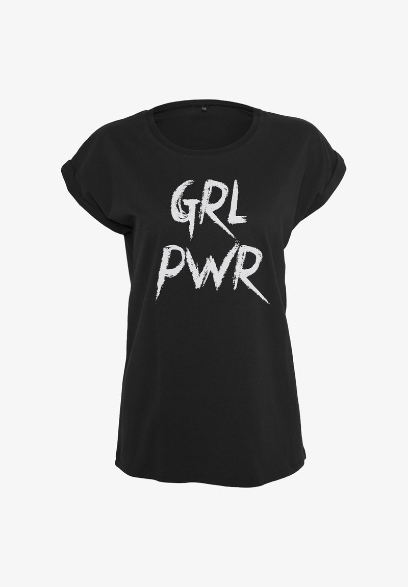 Musthave mustaga mustöötavad varrukatega must T-särk, millel on julge valge kiri "GRL PWR" pintslijoonega font. Pehme puuvillane kangas, lõdvestatud lõige.