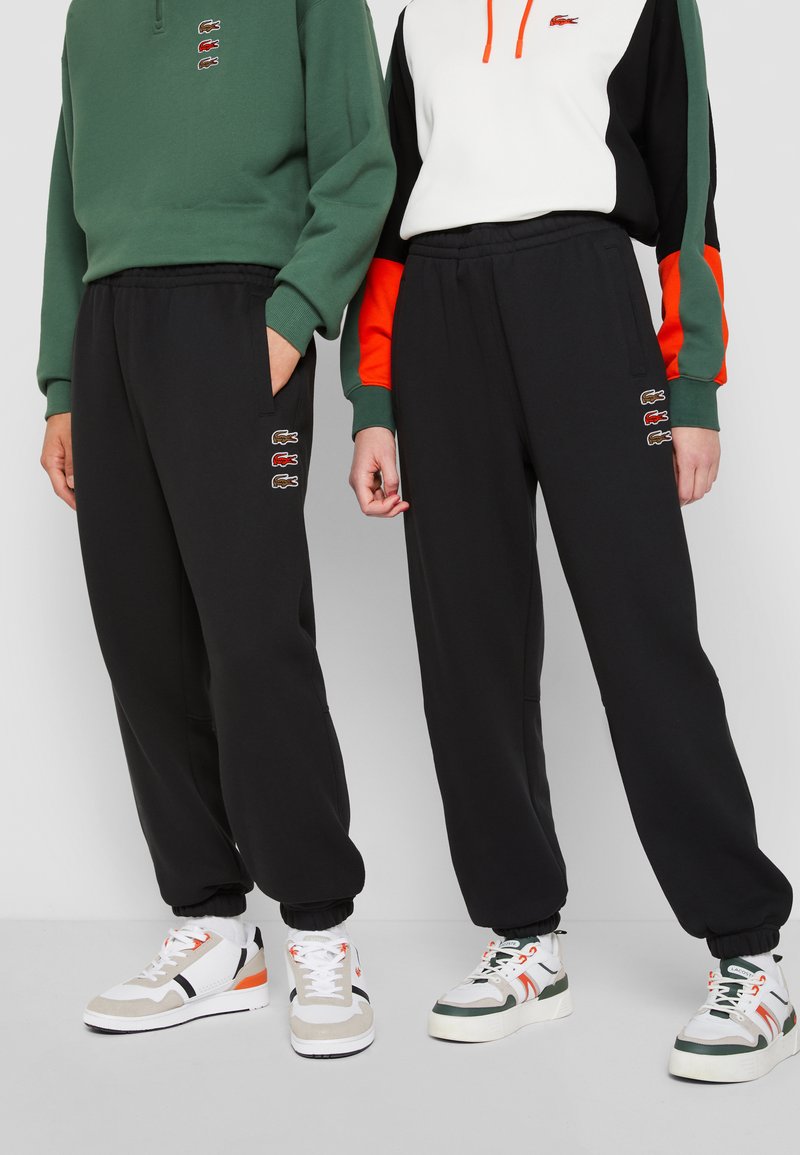 Lacoste - EXCLUSIVE UNISEX - Pantalones deportivos - black, Ampliar