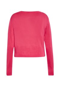 Maglione corto rosa con maniche lunghe, texture liscia e orlo a coste. Scollo rotondo semplice, senza fantasie o decorazioni.