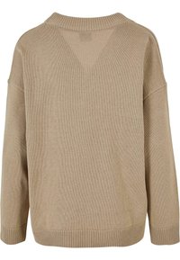 Beige knit sweater with a relaxed fit, wide neck, and ribbed hem and cuffs. Textured surface with a minimalistic design.