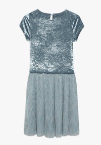 Velvet dress in light blue with cap sleeves. Features a keyhole back and a pleated, shiny skirt. Soft texture throughout.