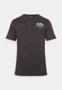 Black short-sleeve T-shirt made of cotton, featuring a distressed finish and a white printed "PUMA sports club" logo on the chest.