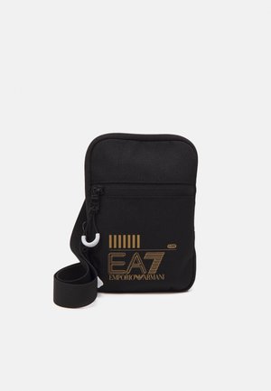 TRAIN CORE MINI POUCH BAG UNISEX - Taška s příčným popruhem - black/gold