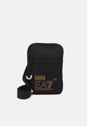 TRAIN CORE MINI POUCH BAG UNISEX - Borsa a tracolla - black/gold