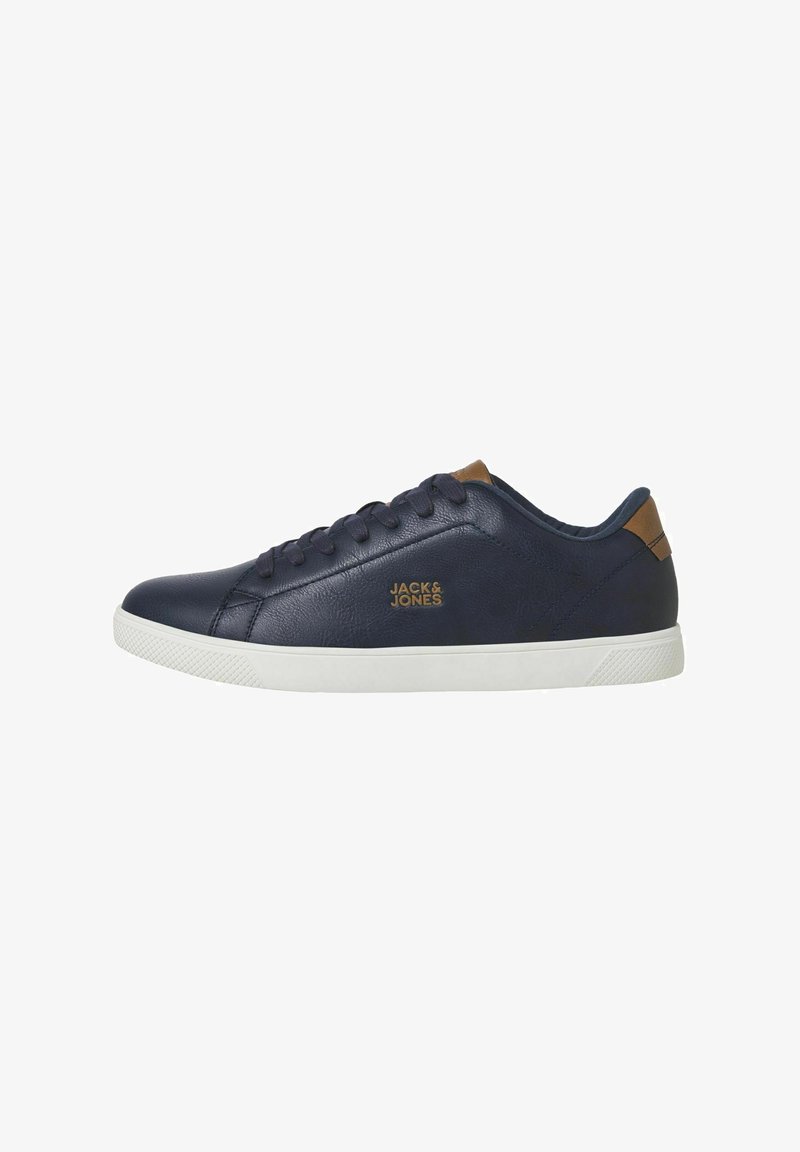 Navy blue leather sneakers with a textured finish, white rubber sole, and brown accents on the heel. Features lace-up design and logo.