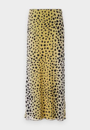 Yellow and black spotted midi skirt made of lightweight fabric, featuring a smooth texture and a straight cut with a hemline.