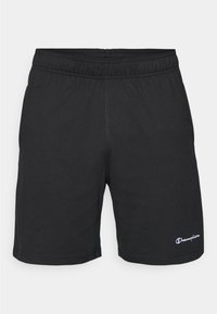 Black athletic shorts with an elastic waistband, made of soft fabric, featuring a small white logo on the lower left side.