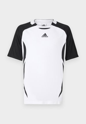 Short-sleeve Adidas t-shirt in white with black accents. Features a crew neck, vertical texture, and side detailing for athletic fit.