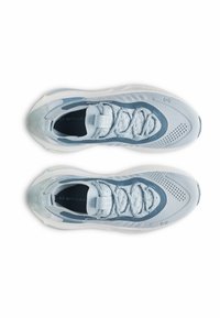 Light blue athletic shoes with a mesh upper and textured design. Features rounded toe, lace closure, and contrasting dark blue accents.