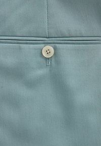 Next MOTIONFLEX  TAILORED - Pantalón de traje - light blue