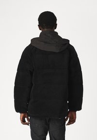 Tommy Jeans PUFFER  - Zimní bunda - black