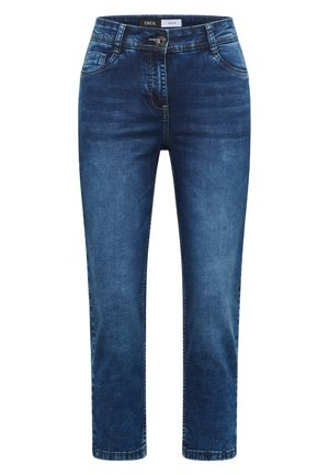 Jean en denim bleu foncé avec poches avant, fermeture par bouton et zip, et léger effet de délavage aux cuisses et aux genoux.