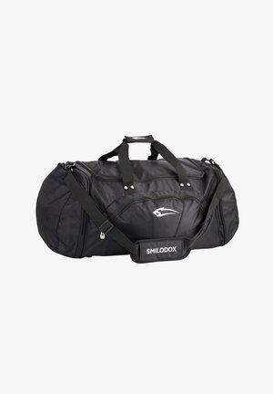 Sort duffel bag lavet af slidstærk nylon, har dobbelte håndtag, justerbar skulderrem og et logo-patch. Lynlåset hovedrum.