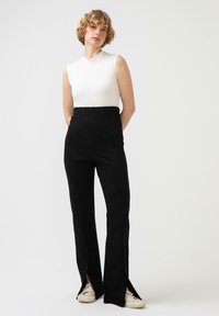Touché Privé SLIT DETAILED - Hlače - black