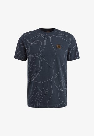 Camiseta de algodón azul marino con un patrón de líneas de contorno blancas y una etiqueta de la marca cuadrada en la parte izquierda del pecho. Cuello redondo estándar y mangas cortas.