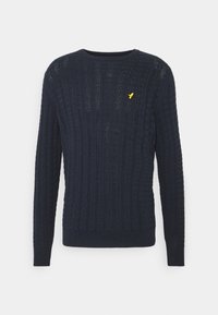 Pull bleu marine foncé en maille torsadée avec manches longues et petit emblème jaune d'oiseau sur la poitrine gauche.