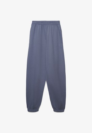 Lekkie, szare spodnie dresowe z elastycznym pasem i ściągaczami przy nogawkach, wyposażone w boczne kieszenie oraz gładką, miękką fakturę.