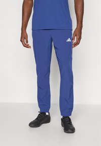 adidas Performance TECH APP - Træningsbukser - dark blue/glow blue