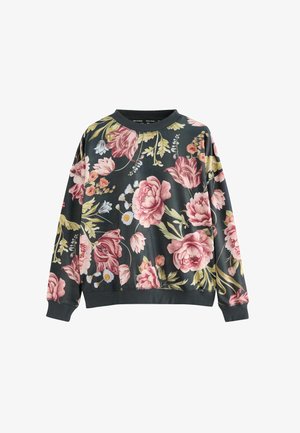 Lillelilleline dressipluus tumesinise taustaga, millel on suured roosad ja kreemjad lillede, roheliste lehtede ja ümar kaelus. Pikad varrukad.