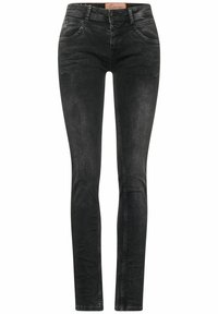 Svarta skinny jeans i denim med en klassisk femfickdesign, blekt tvätt, dragkedja och knappstängning samt bälteshällor vid midjan.
