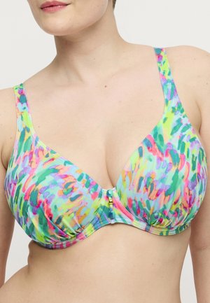 Vrouw draagt een kleurrijke beugelbeha met een abstract bloemmotief en kleine decoratieve kralen aan de voorkant in het midden.