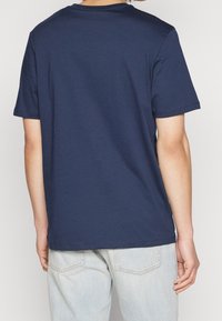 Timberland Triko s potiskem - dark blue