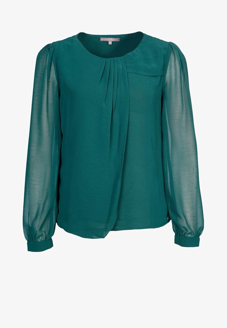 Tealfärgad blus med rund halsringning, långa genomskinliga ärmar och plisserade detaljer på framsidan, tillverkad av lättviktsmaterial med en slät yta.