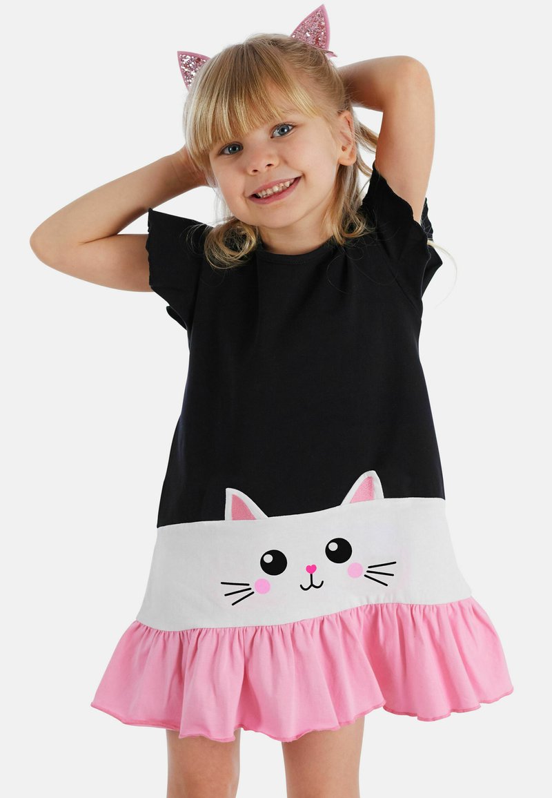 Mustahar black cotton dress with short sleeves, in which a white ruffle hem and a cat face design are accented with pink details, along with a pink ruffled skirt.