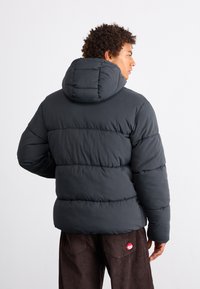 Champion Rochester ICONS HOODED JACKET - Vinterjakke - black