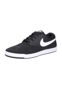 Black suede skate shoes with white Nike swoosh, featuring a low-top design, lace-up closure, and rubber sole with contrast detailing.
