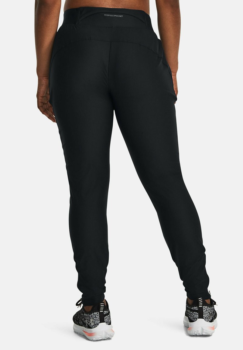 Pantaloni sportivi neri con un design a gamba affusolata, realizzati in materiale elasticizzato. Presentano una vita alta e cuciture piatte.