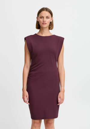 Lila enges Kleid mit kurzen Ärmeln, Raffung an der Seite und glattem, dehnbarem Stoff. Knielange Silhouette mit minimalistischem Design.