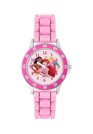 Montre enfant rose avec un bracelet en silicone flexible. Le cadran rond présente des personnages de princesses Disney sur un fond rose clair, des numéros en gras et une lunette rose.