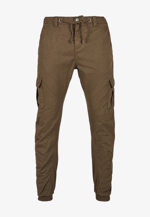 Khaki kalhoty v olivově zelené barvě, vyrobené z odolné látky. Mezi funkce patří stahovací pas, boční kapsy a elastické manžety na kotnících.