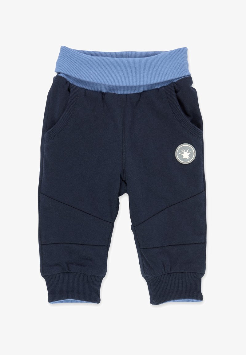 Pantalon pour tout-petit bleu marine avec ceinture et poignets élastiques bleu clair, poches latérales, et un patch circulaire gris avec un motif éclaboussure blanc.