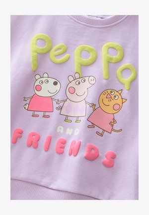 Felpa color lavanda chiaro con grafica in rilievo e testurizzata con la scritta "Peppa" in verde e personaggi dei cartoni animati: Peppa, Suzy Pecora e Gatto Patata, in colori vivaci.