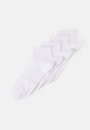 Four pairs of white cotton socks, ankle-length with ribbed cuffs, smooth texture, and no visible patterns or branding.