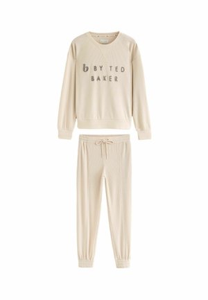 Béžová žebrovaná souprava na volný čas obsahující svetr s V-výstřihem a textem "by Ted Baker" a kalhoty se shodným elastickým pasem.