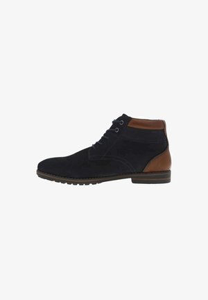 Bottes mi-hautes pour hommes en daim bleu marine foncé avec une accent en cuir marron au talon. Présentent une fermeture à lacets et une semelle en caoutchouc texturé.