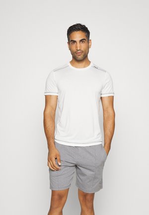 White athletic t-shirt with short sleeves, round neck, and contrast stitching, paired with gray shorts featuring a drawstring waist.